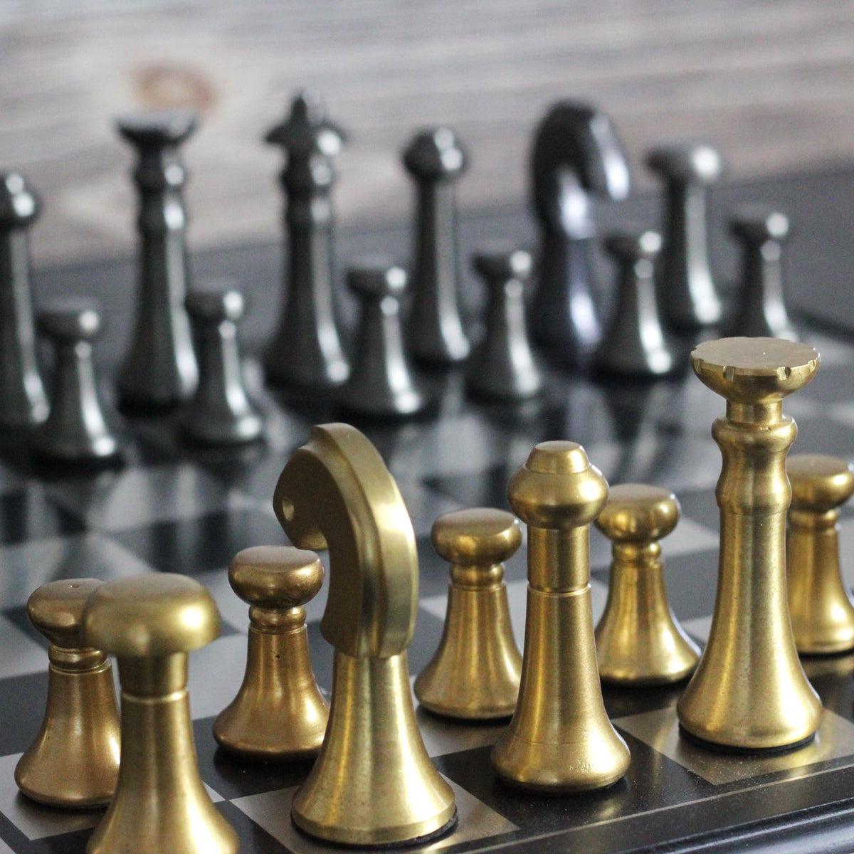 The Modern Defense - Black and Gold Metallic Chess Set - Marble Cultures